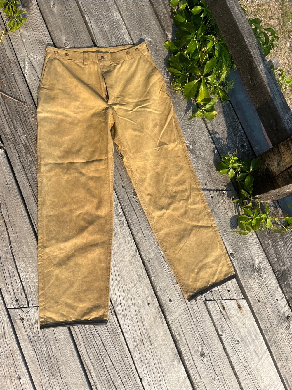 Vintage Filson  oil finished single tin cloth pants with leather finish cuff.